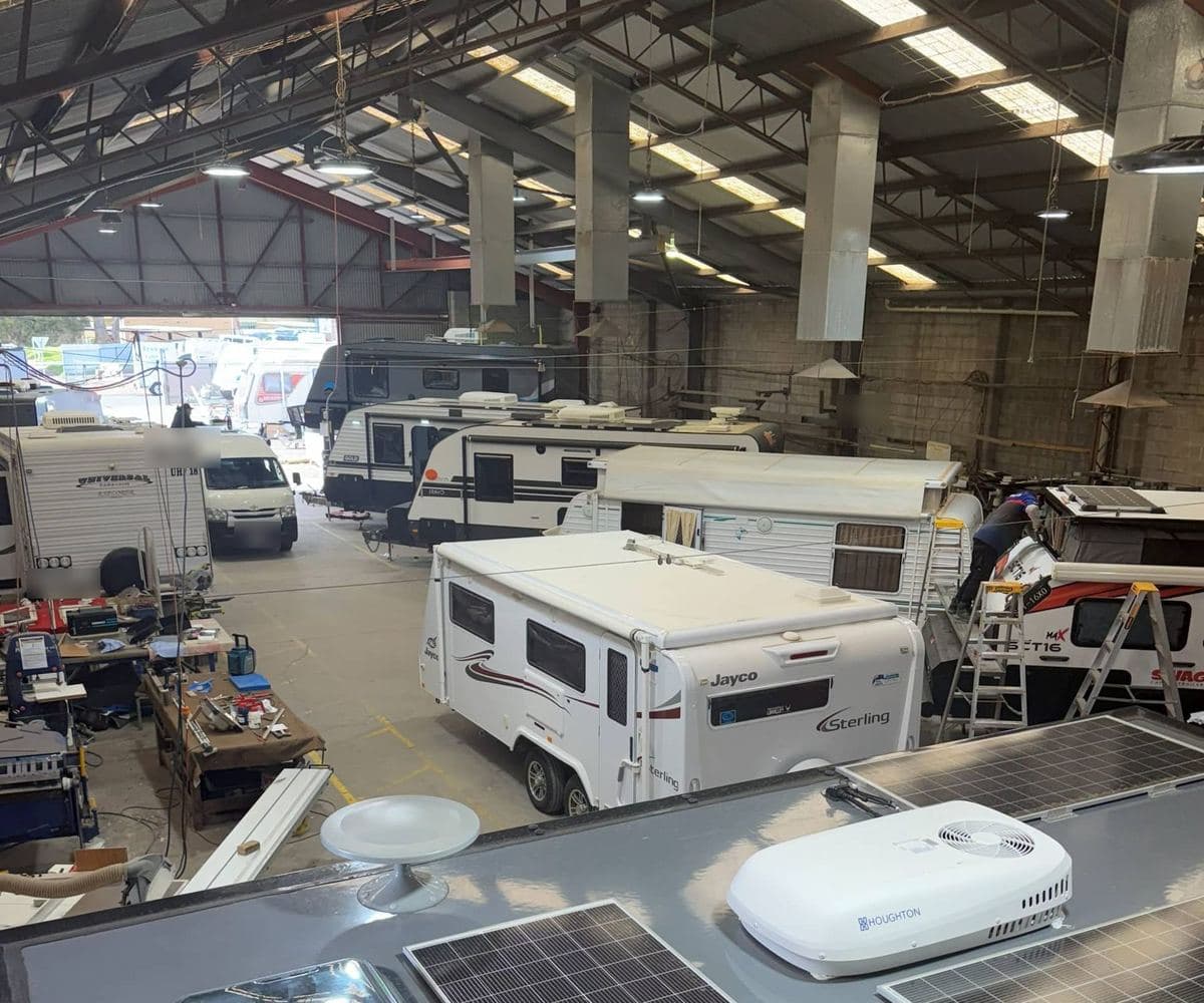 Caravans in for service inside the Dario workshop at St Marys